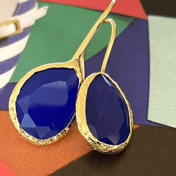Flowrette Blue Glue boucles d'oreilles laiton doré pierre bleue