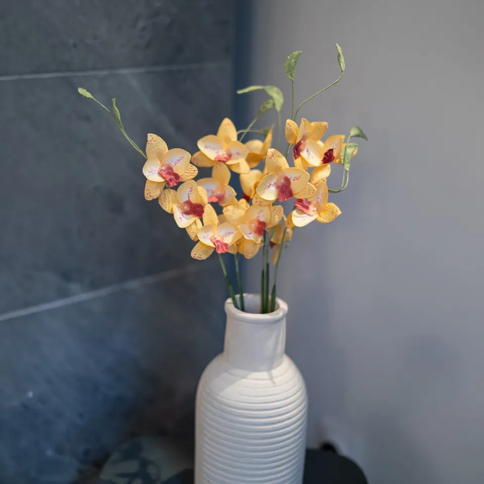 Flowrette Vanda orchidée en papier jaune x1 tige