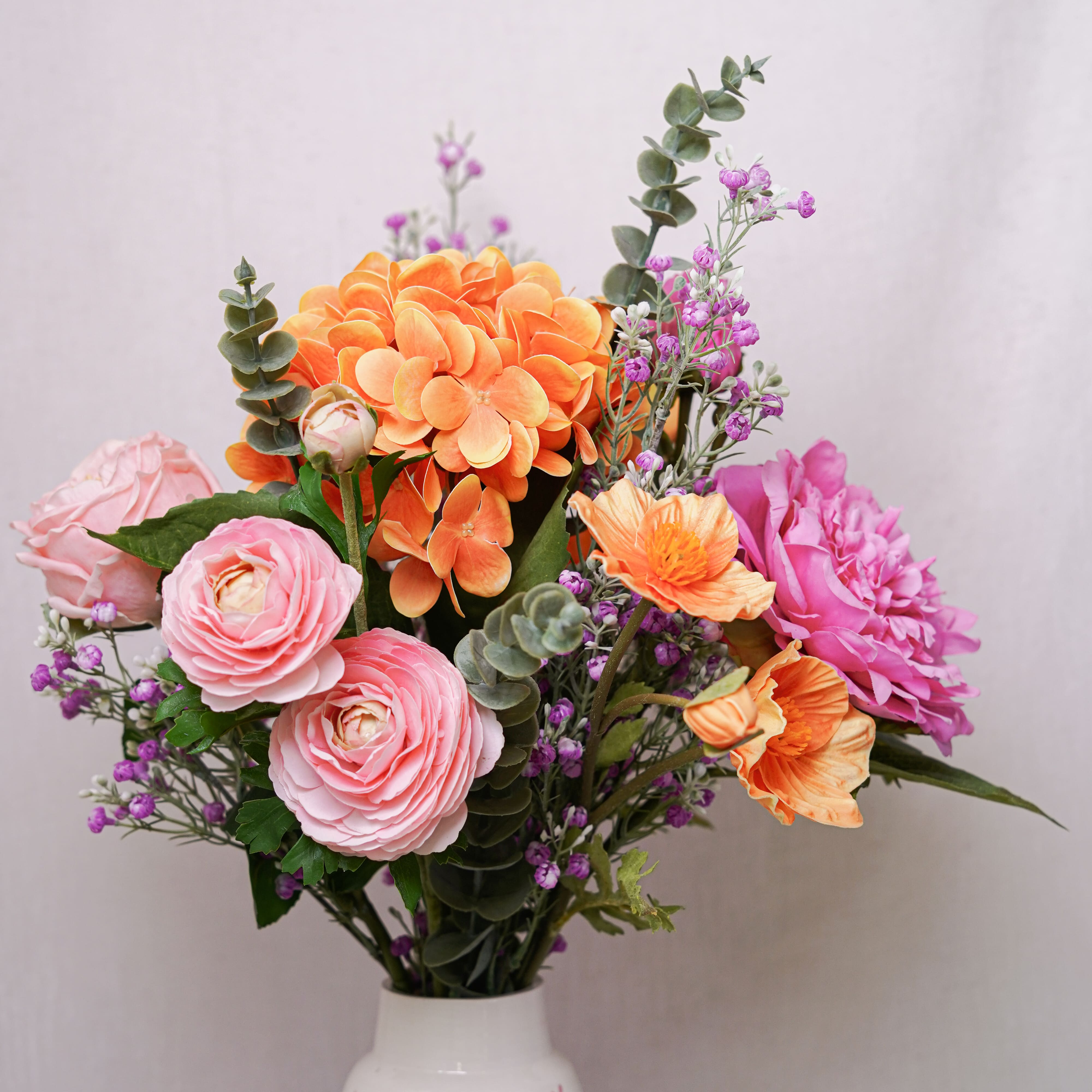 Flowrette Adèle bouquet fleurs artificielles orange rose sans entretien