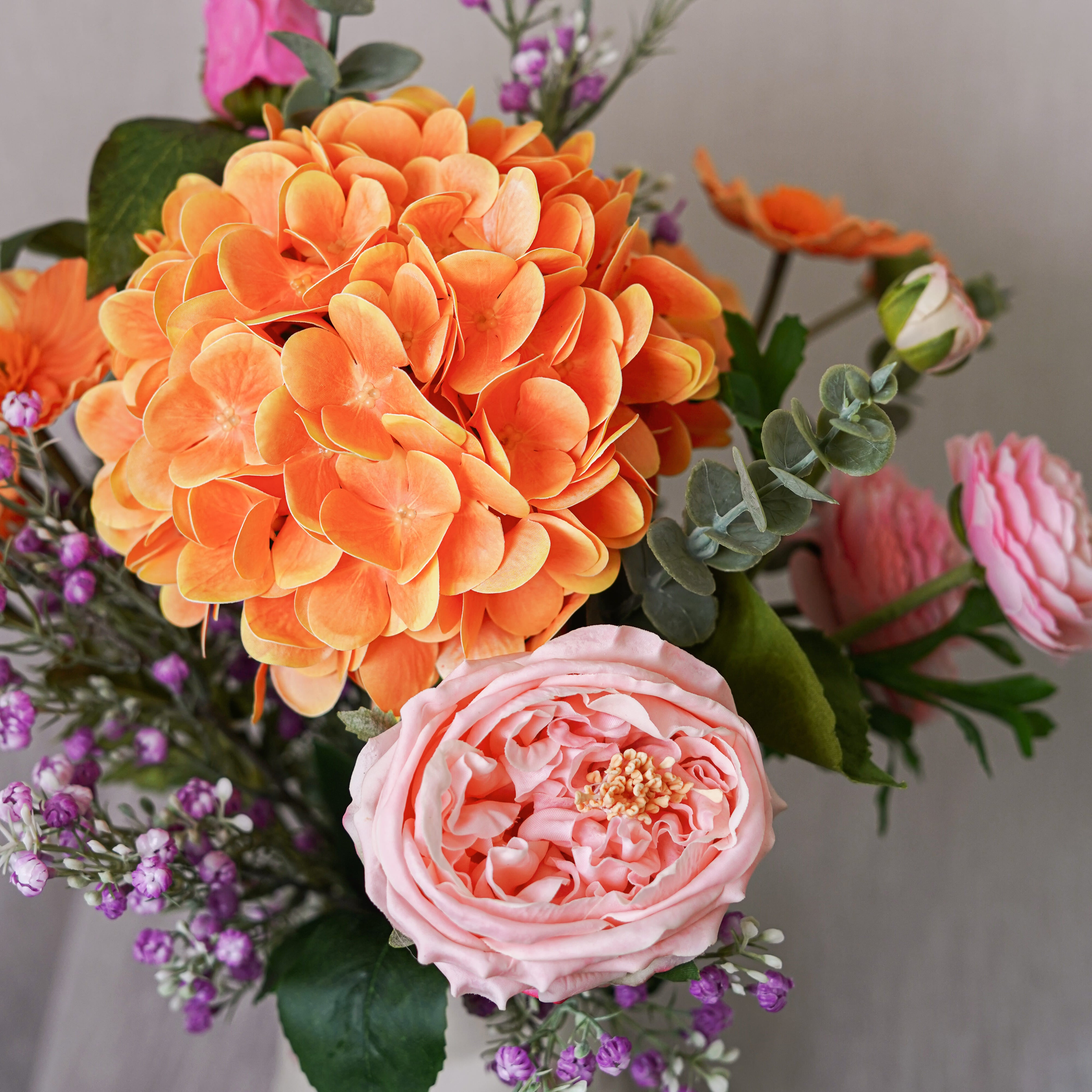 Flowrette Adèle bouquet fleurs artificielles orange rose sans entretien
