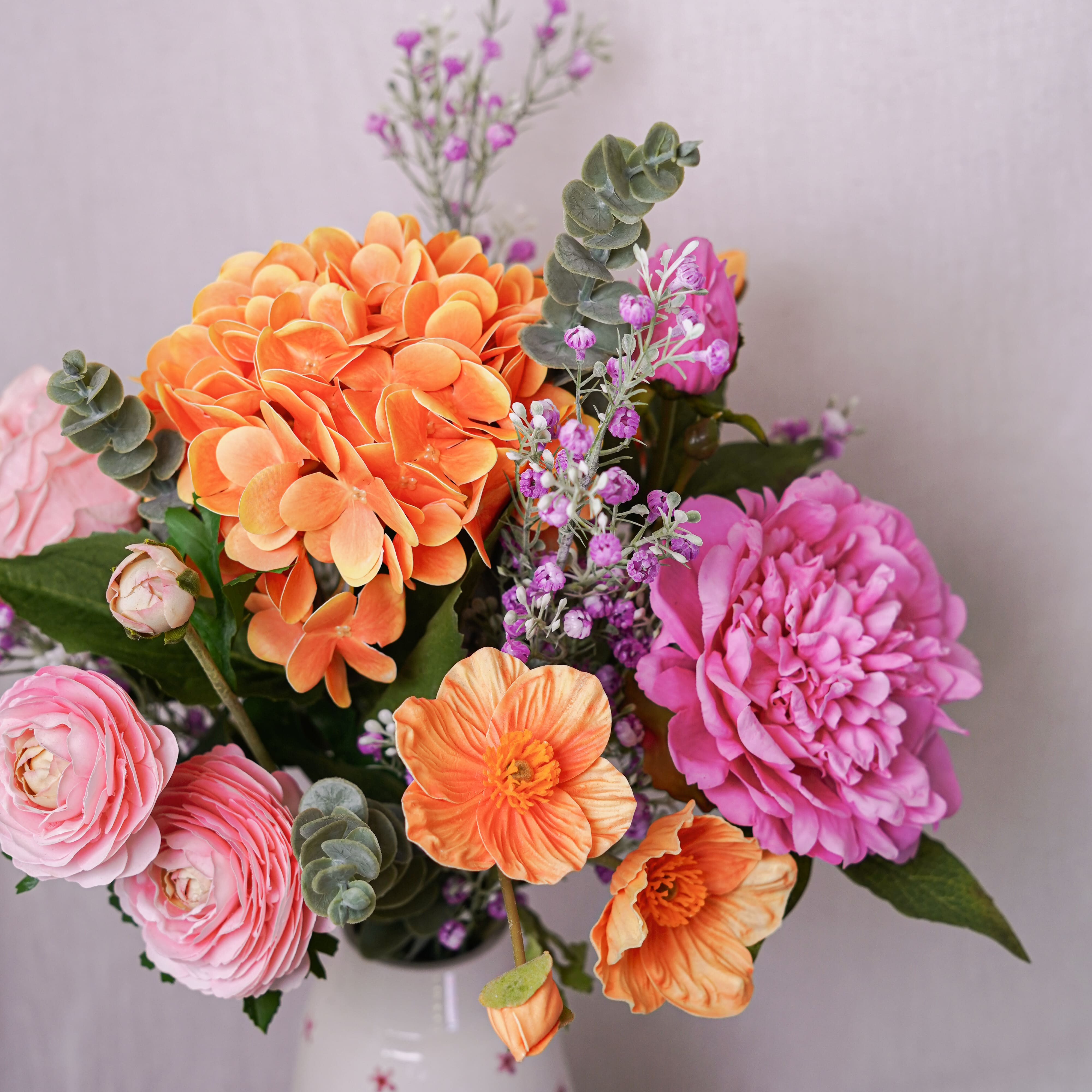 Flowrette Adèle bouquet fleurs artificielles orange rose sans entretien