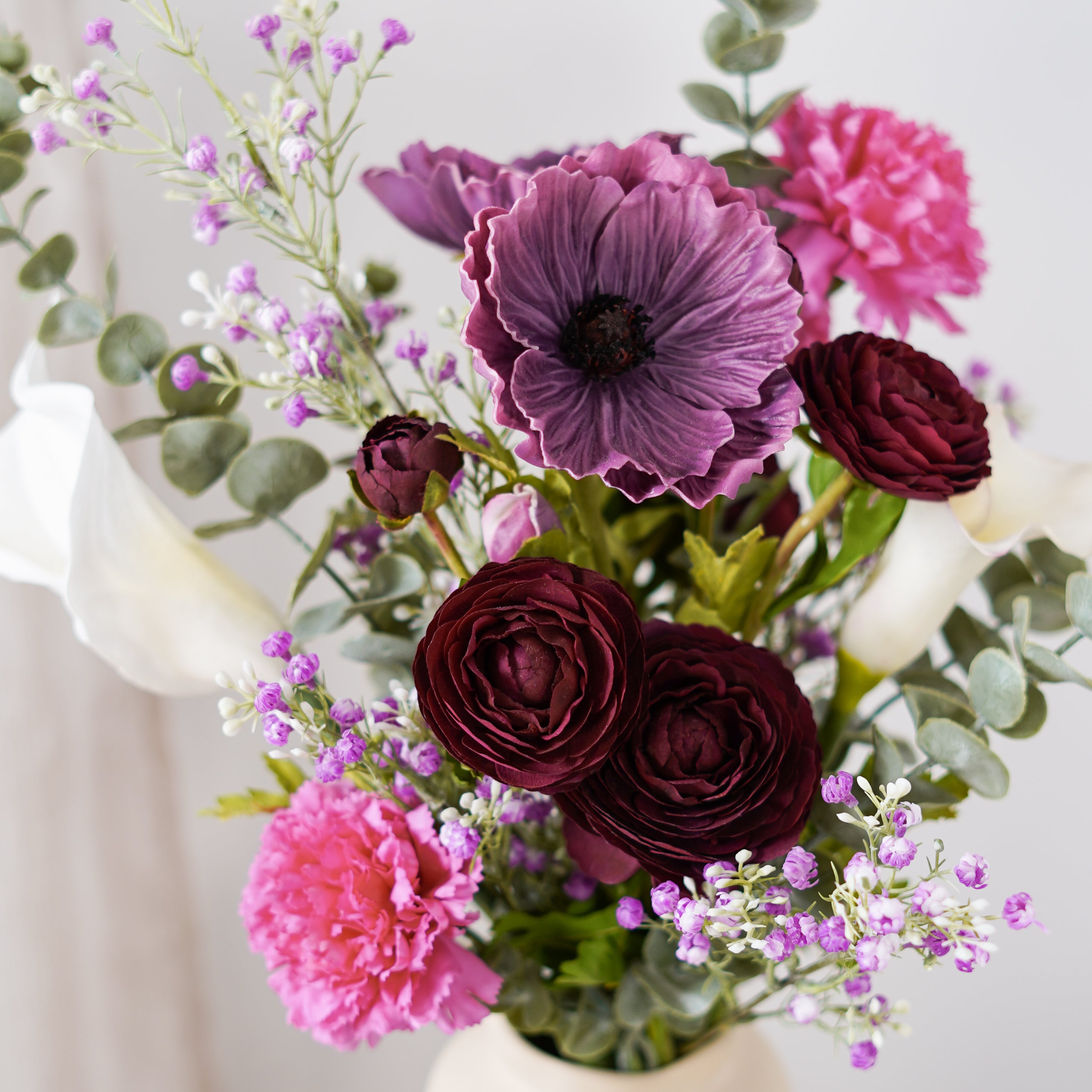 Flowrette Emeline bouquet artificiel blanc violet durable