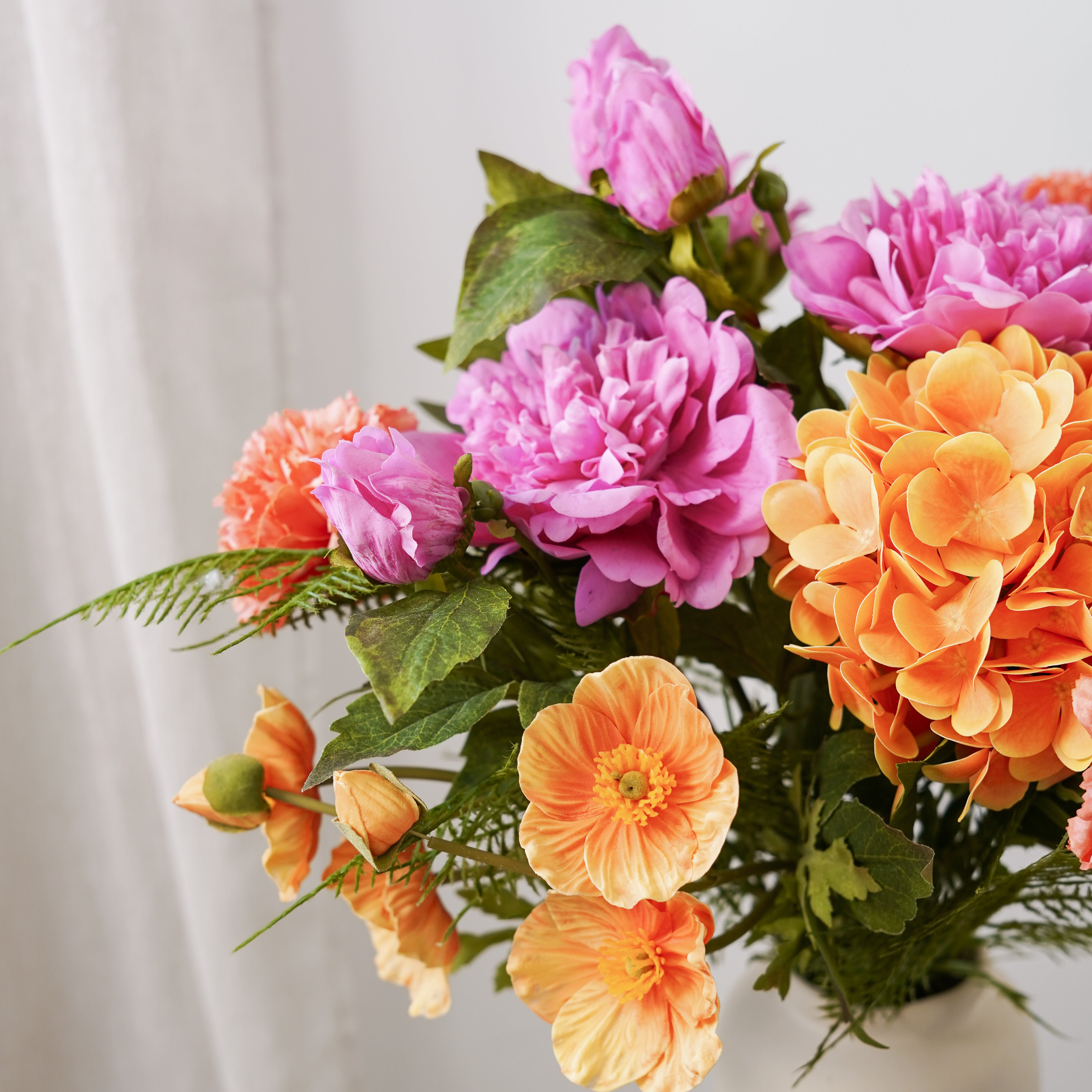 Flowrette Margot bouquet artificiel orange rose prestige
