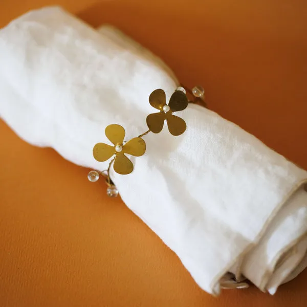 Flowrette Kalika rond de serviette laiton doré fleur
