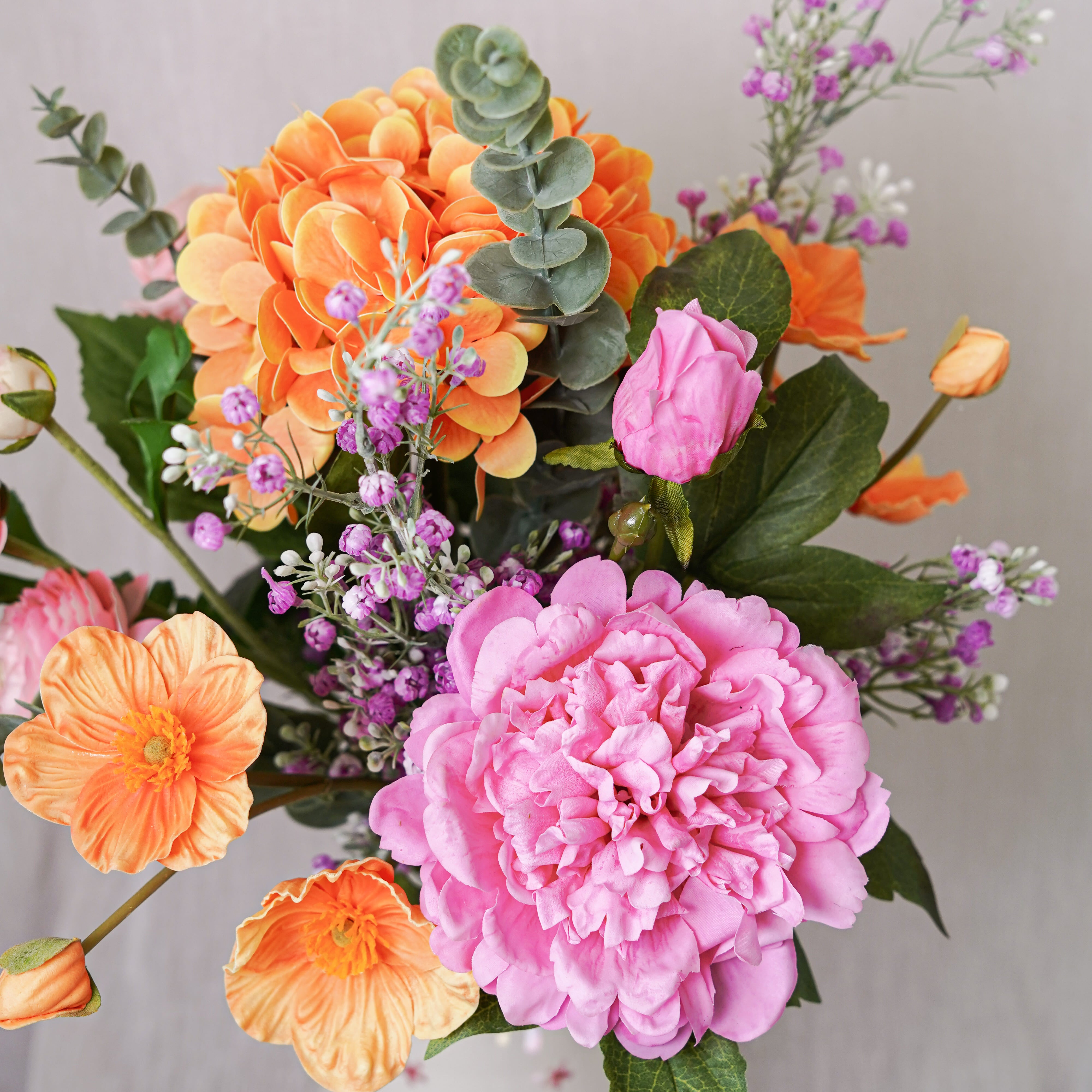 Flowrette Adèle bouquet fleurs artificielles orange rose sans entretien