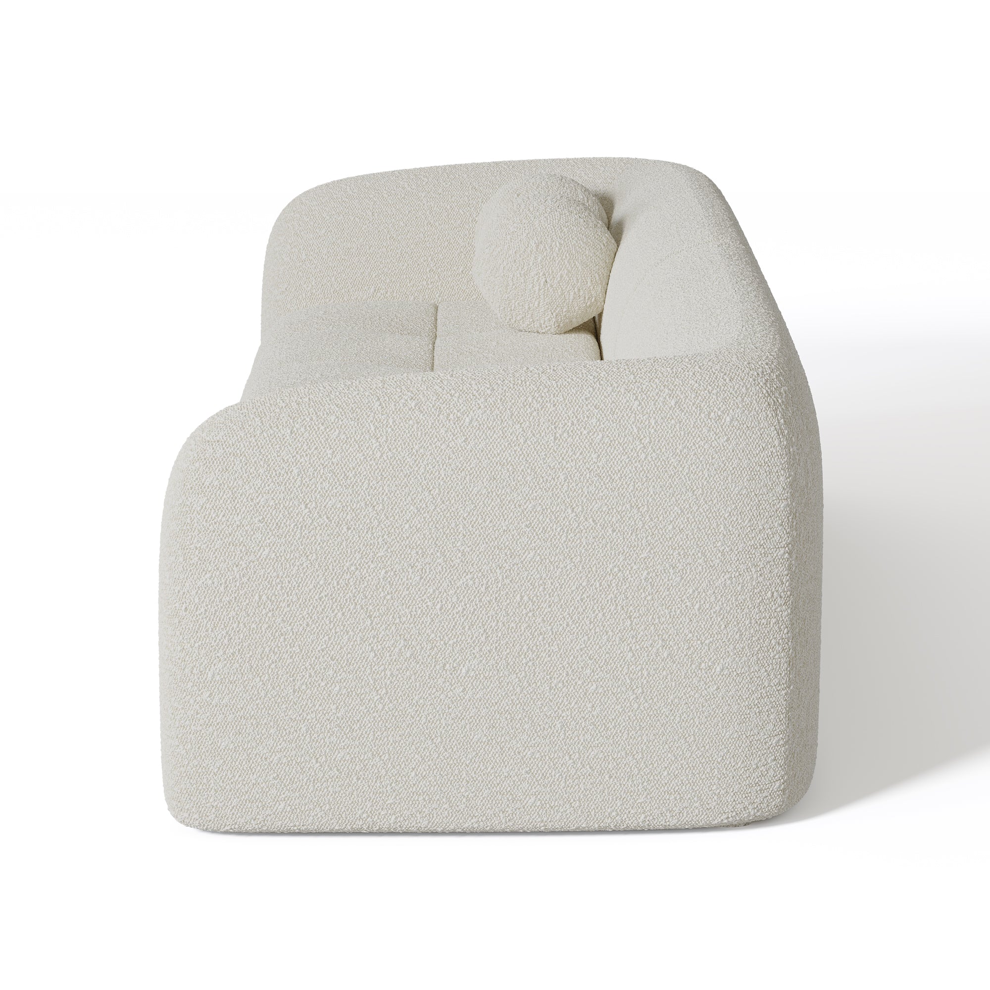 Sia Haussmann canapé crème courbes arrondies coussins boules