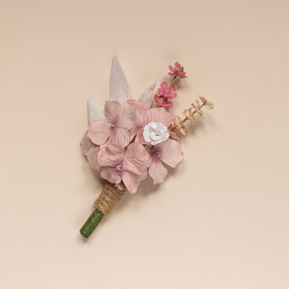 Flowrette Boutonnière fleur papier rose poudré mariage