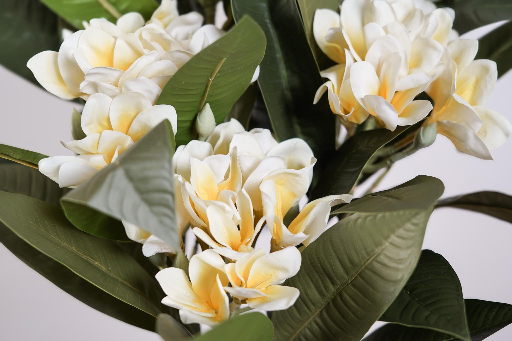 Flowrette frangipanier jaune fleur artificielle tige x1 sans entretien