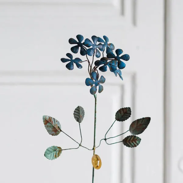 Flowrette Kalika fleur laiton bleu patiné déco salon